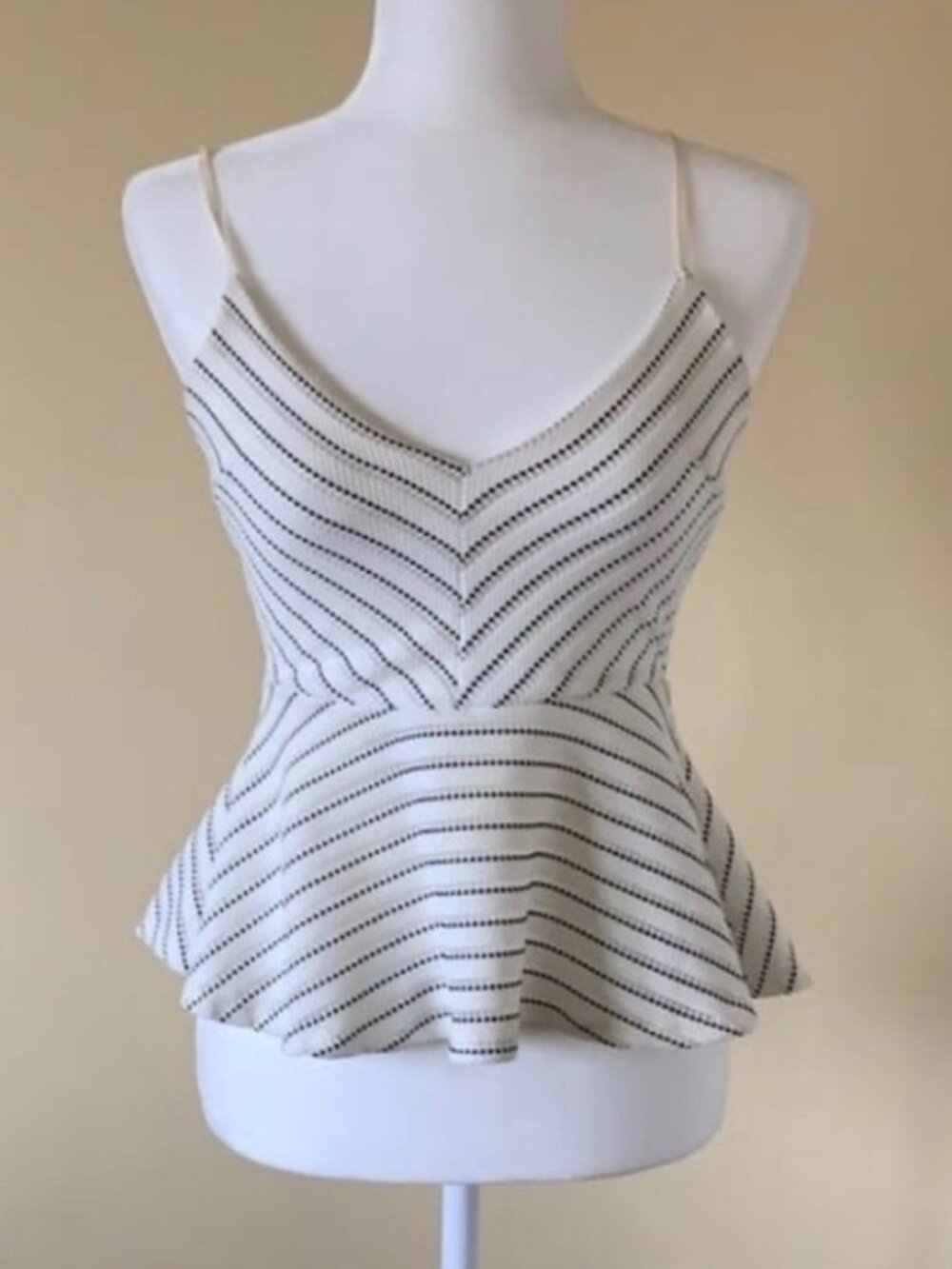 Black and white striped peplum top.